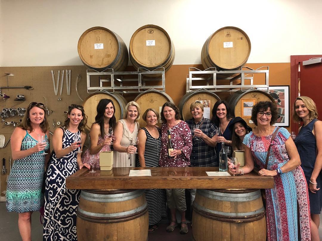A group tasting wine at the Loxton barrel-room bar